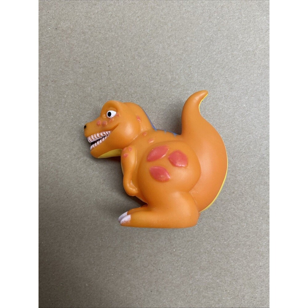 Dinosaur water squirt toy 2.5” orange red T-Rex Amscan